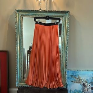Long accordion fold orange skirt, S